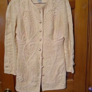 Peach jacket with short skirt